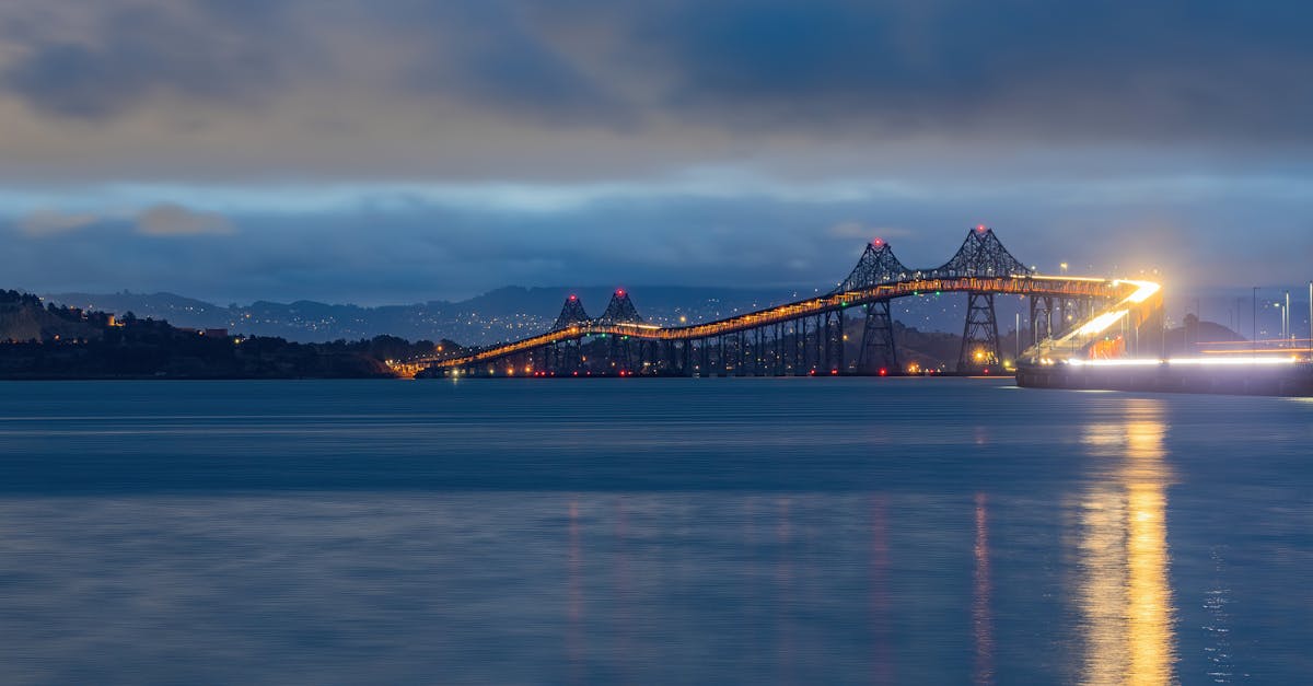 Stunning twilight view of the illuminated Richmond-San Rafael Bridge spanning San Francisco Bay.