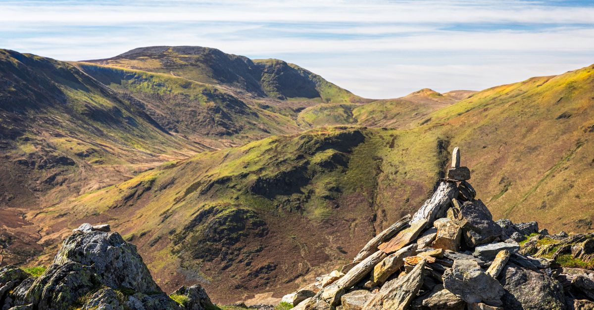 Scenic view of the rolling hills and rock formations in Cockermouth, England.