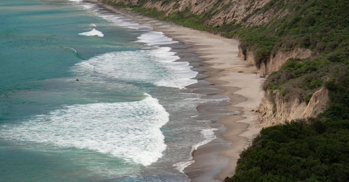 Stunning aerial view of San Lorenzo Beach in Ecuador with waves crashing against the coast.