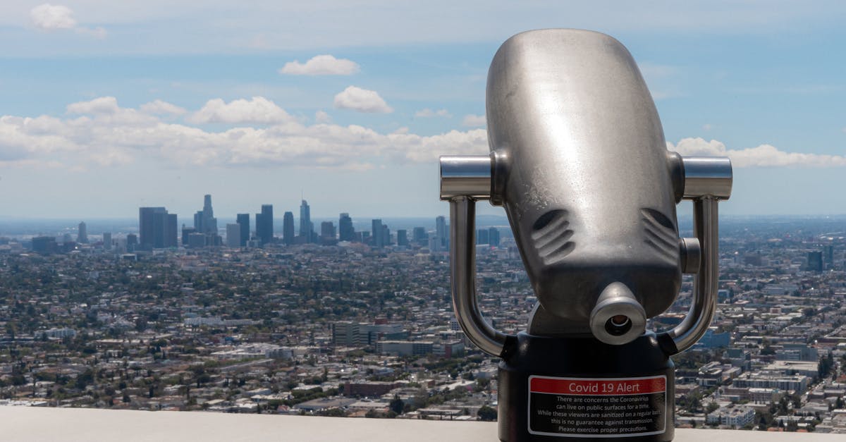 Coin-operated binoculars overlooking the Los Angeles skyline from Griffith Observatory.