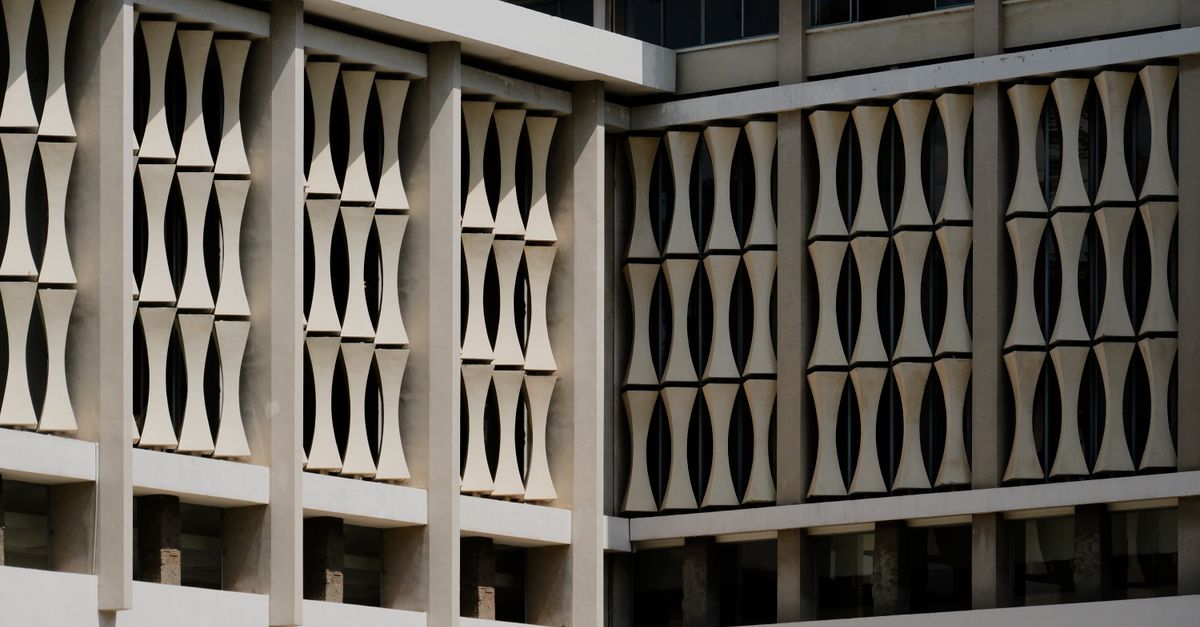 Detailed facade of Independence Palace with unique geometric patterns in Ho Chi Minh City, Vietnam.