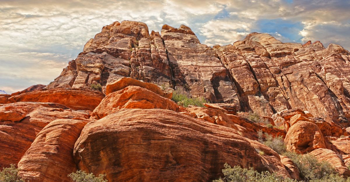 Capture of Red Rock Canyon's stunning geological formations during a serene sunset.