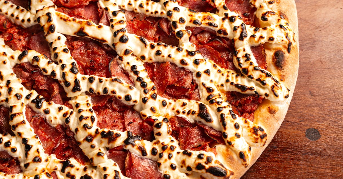 Close-up of a pepperoni pizza with melted cheese, perfect for food enthusiasts.