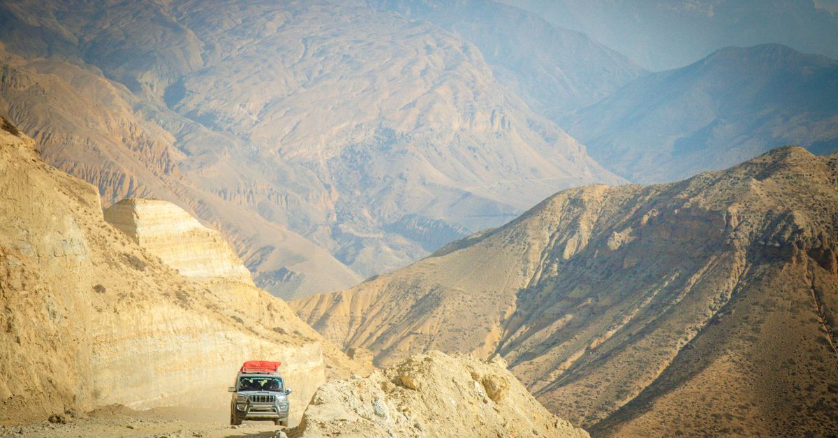 A stunning view of rugged mountains in Upper Mustang, Nepal, showcasing natural beauty.