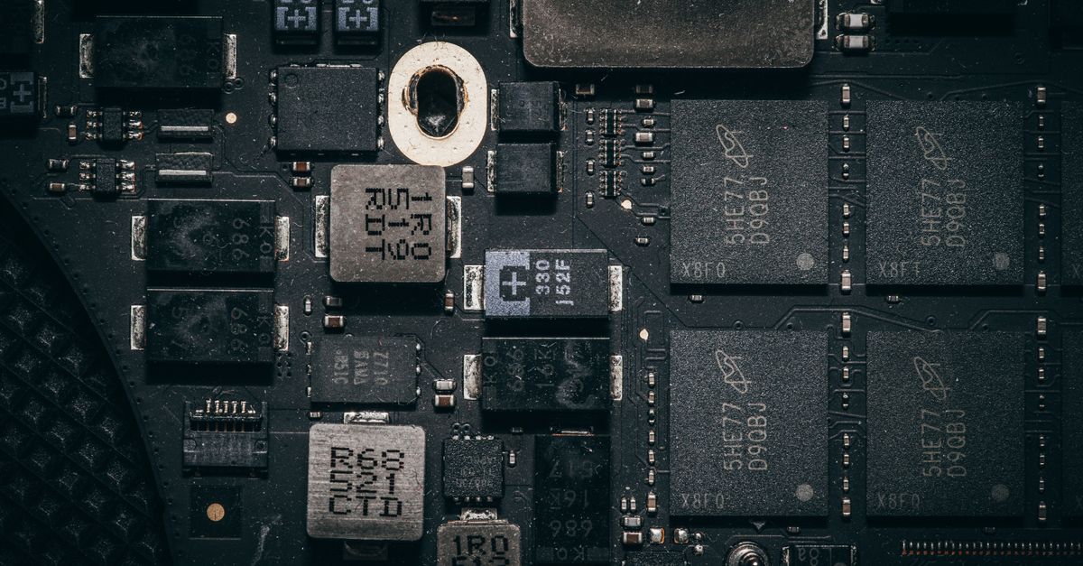 Detailed close-up of a computer circuit board highlighting electronic components and intricate design.