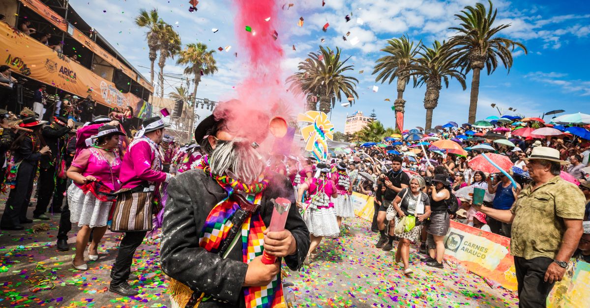 Colorful carnival in Arica, Chile with festive dancers, music, and cheerful crowds