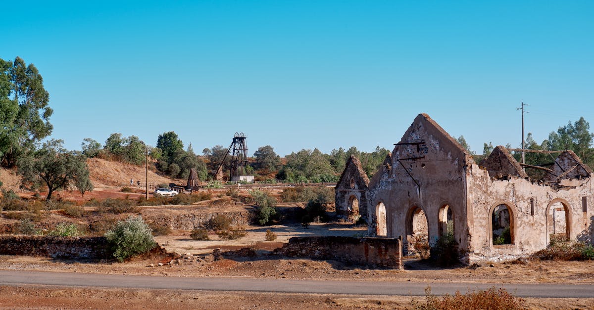 Explore the abandoned mining ruins in Achada do Gamo, Portugal's historical site.