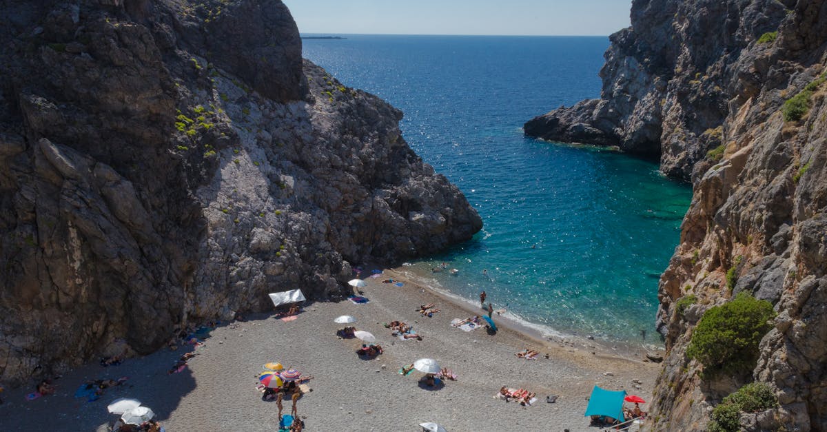 Discover the beauty of Kythira's secluded beach cove with crystal-clear waters and striking cliffs.