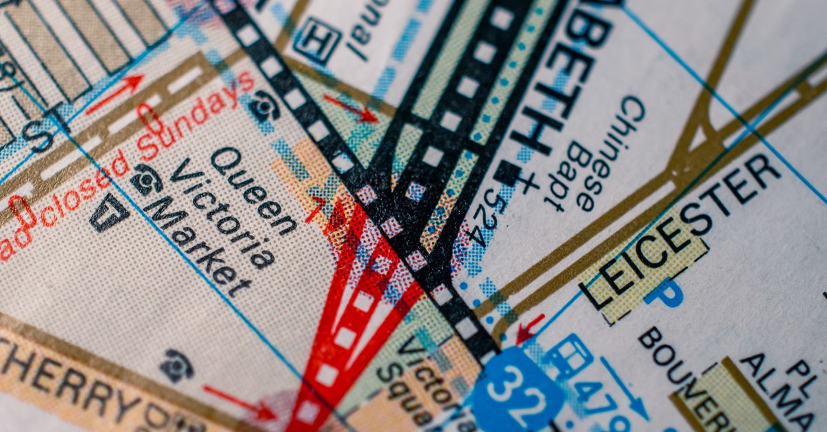 Detailed close-up of Melbourne map highlighting Queen Victoria Market and other landmarks in vivid colors.