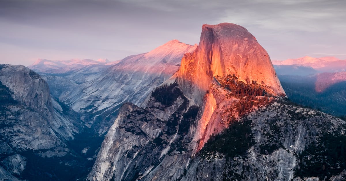A stunning aerial view of Half Dome at sunset in Yosemite National Park, California.