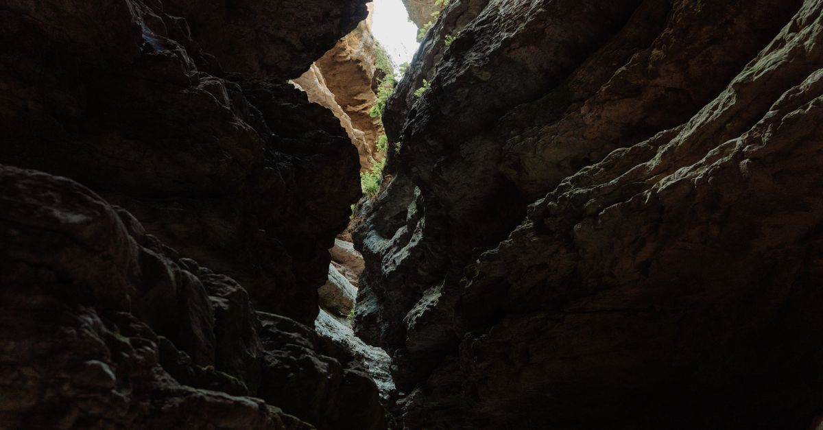 Explore the stunning rock formations of a limestone cave in Dagestan.