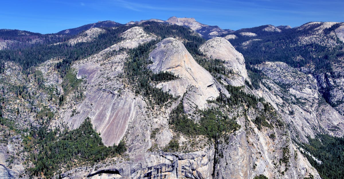 Stunning aerial landscape of the Royal Arches in Yosemite National Park, captured in clear daylight.